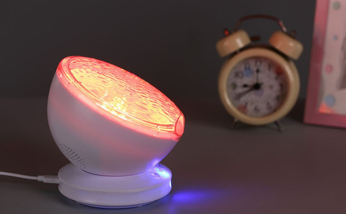 جهاز عرض أمواج المحيط، مصباح ليلي LED بجهاز تحكم عن بعد، مشغل موسيقى ببطاقات TF، مكبر صوت عرض الشفق القطبي