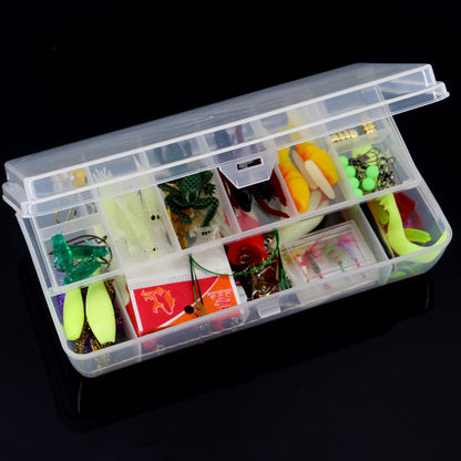 a plastic container filled with lots of different types of fishing lures